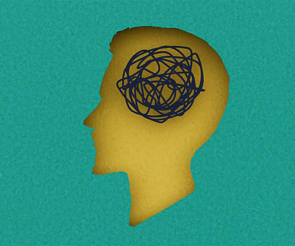 Silhouette einer Person mit Knäuel im Kopf als Symbol für Delir