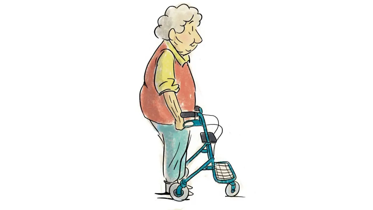 ältere Frau steht mit aufrechter Körperhaltung am Rollator